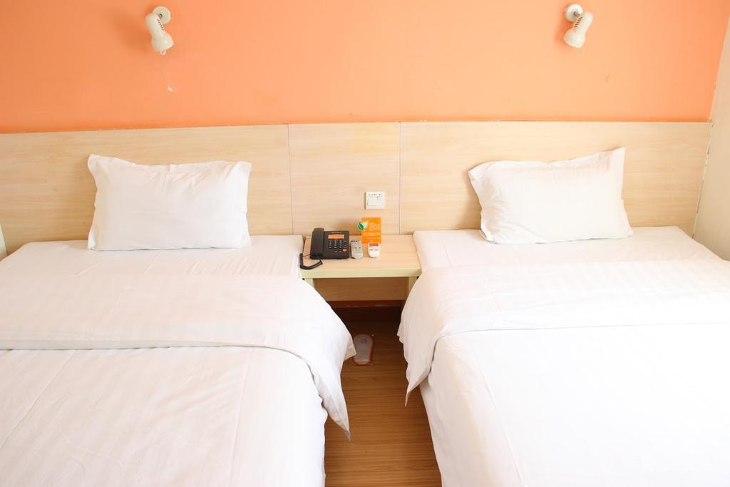 7Days Inn Dalian Gangwan Square Station Port Habitación foto